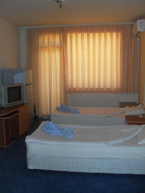 Dreibettzimmer mit Balkon