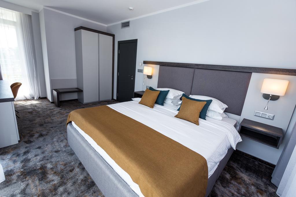 Family Suite - Two King Bedroom with Lounge Room & Pool View